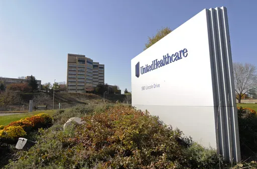 A sign stands on UnitedHealth Group Inc.'s campus in Minnetonka, Minn., Oct. 16, 2012. (AP Photo/Jim Mone, File)