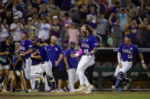 LSU's Tommy White (47) runs home after hitting a walk-off home run against Wake Forest in the 11th inning in a baseball game at the NCAA College World Series in Omaha, Neb., Thursday, June 22, 2023. (AP Photo/John Peterson, File)