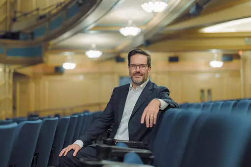 This photo provided by the Louisiana Philharmonic Orchestra shows new conductor Matthew Kraemer, who is pictured at the Orpheum in New Orleans on Nov. 8, 2022. For 17 seasons, the LPO has been under the musical direction of Carlos Miguel Prieto. That changes in the summer of 2023 when the orchestra begins to take its cues from Kraemer. The orchestra's Board of Trustees recently announced that Kramer will take over in July 2023 and have his official introduction to music lovers in mid-September. 