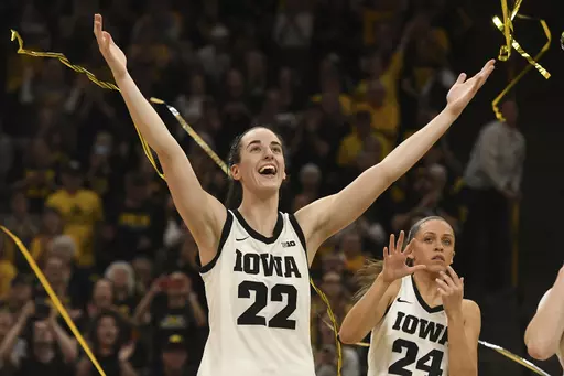 Iowa guard Caitlin Clark (22) celebrates during Senior Day ceremonies following a victory over Ohio State in an NCAA college basketball game, Sunday, March 3, 2024, in Iowa City, Iowa. (AP Photo/Cliff Jette)