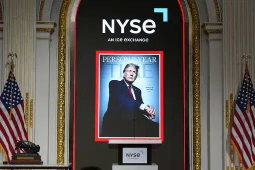 The cover of Time magazine's Person of the Year shows President-elect Donald Trump before a ceremony he will attend at the New York Stock Exchange in New York, Thursday, Dec. 12, 2024. (AP Photo/Alex Brandon)