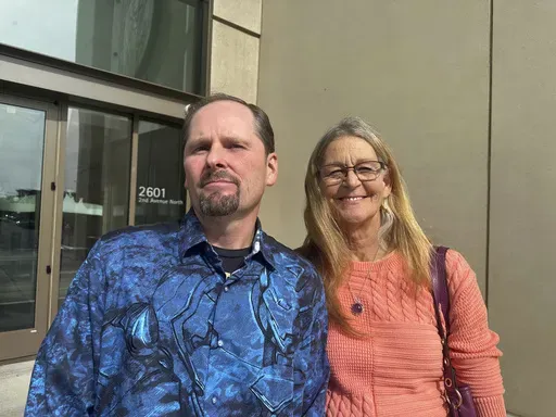 Richard Rogers and his wife Laurie stand outside the James F. Battin Federal Courthouse, Tuesday, Oct. 1, 2024, in Billings, Mont. (AP Photo/Matthew Brown, File)