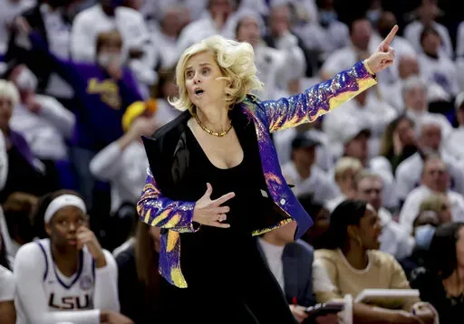 LSU head coach Kim Mulkey reacts to a play in the second half of an NCAA college basketball game against South Carolina in Baton Rouge, La., Thursday, Jan. 6, 2022. Mulkey has LSU back in the top 10 for the first time in 13 years as the Tigers moved up three places to No. 8 in The Associated Press women's basketball poll Monday, Feb. 21, 2022. (AP Photo/Derick Hingle, File)