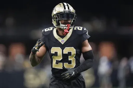 New Orleans Saints cornerback Marshon Lattimore (23) warms up before an NFL football game against the Carolina Panthers in New Orleans, Sept. 8, 2024. (AP Photo/Gerald Herbert, File)