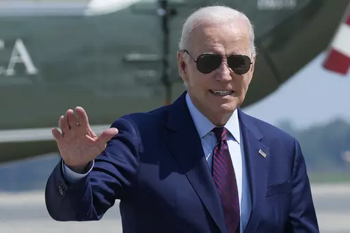 President Joe Biden waves as he walks to board Air Force One at Andrews Air Force Base, Md., Friday, July 28, 2023. Biden is heading to Maine for the first time of his presidency, packaging his signing of an executive order with a speech at a textile factory and a fundraiser later in the town of Freeport. (AP Photo/Susan Walsh)