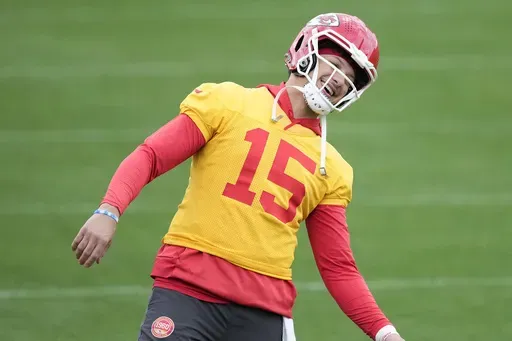 Kansas City Chiefs quarterback Patrick Mahomes (15) stretches during an NFL football practice Thursday, Feb. 6, 2025, in New Orleans, ahead of Super Bowl 59 against the Philadelphia Eagles. (AP Photo/Brynn Anderson)