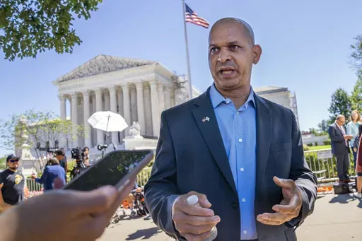 Former U.S. Capitol Police Sgt. Aquilino Gonell, who defended the Capitol on Jan. 6, is interviewed outside of the Supreme Court, July 1, 2024, after the court decision o the immunity case of former President Donald Trump, in Washington. (AP Photo/Jacquelyn Martin, File)