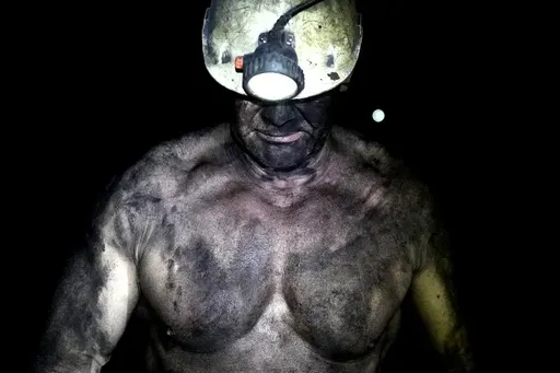 A miner walks in a shaft of the CSM coal mine in Stonava, Czech Republic, Monday, Oct. 14, 2024. (AP Photo/Petr David Josek)