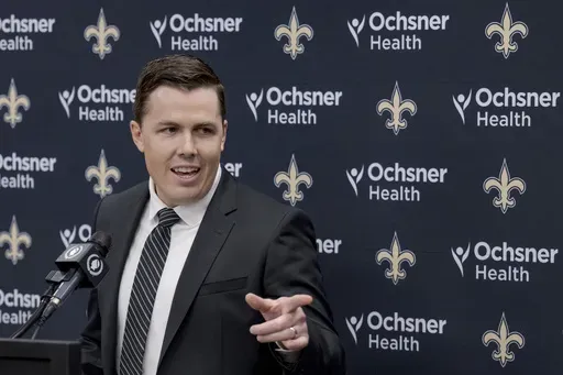 New Orleans Saints new head coach Kellen Moore is introduced at an NFL football conference in Metairie, La. Thursday, Feb. 13, 2025. (AP Photo/Matthew Hinton)