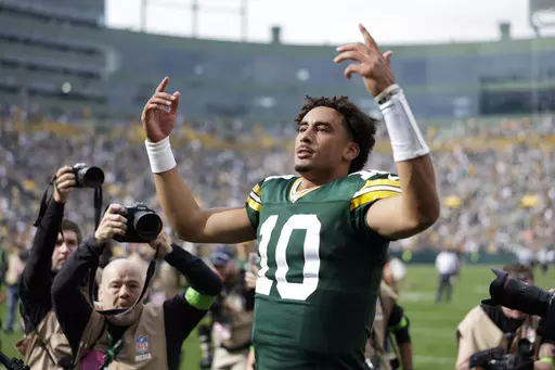 Green Bay Packers quarterback Jordan Love (10) celebrates after an NFL football game against the New Orleans Saints Sunday, Sept. 24, 2023, in Green Bay, Wis. The Packers won 18-17. (AP Photo/Matt Ludtke)
