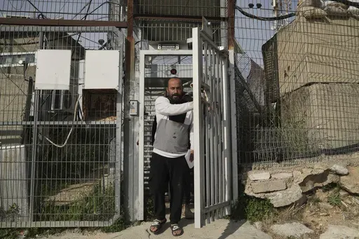 Hamdan Ballal, Oscar-winning Palestinian director of "No Other Land," is released from a police station in the West Bank settlement of Kiryat Arba a day after being detained by the Israeli army following an attack by Jewish settlers, Tuesday, March 25, 2025. (AP Photo/Leo Correa)