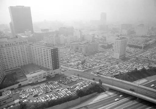 This Sept. 13, 1979, file photo shows motorists as downtown parking lots fill up in Los Angeles. Over 170 million of people born in the United States who were adults in 2015 were exposed to harmful levels of lead as children, according to a study published in the Proceedings of the National Academy of Sciences on Monday, March 7, 2022. The researchers looked only at lead exposure caused by leaded gasoline, the dominant form of lead exposure from the 1940s to the late 1980s, according to data fro