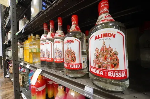 This is a display of Alimov Vodka, from Russia, in a Total Wine and More store in University Park, Fla., on Sunday, Feb. 27, 2022. The House voted overwhelmingly Thursday, March 17, to suspend normal trade relations with Russia and Belarus, preparing for President Joe Biden to enact higher tariffs on more products and further weaken the Russian economy in response to its military assault on Ukraine. The U.S. has already taken steps to shut off the importation of Russian oil, liquefied natural ga