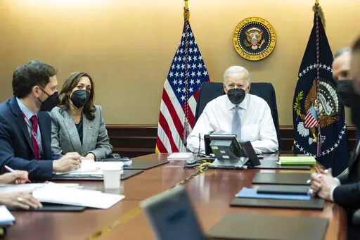 In this image provided by The White House, President Joe Biden and Vice President Kamala Harris and members of the President's national security team observe from the Situation Room at the White House in Washington, on Feb. 2, 2022, the counterterrorism operation responsible for removing from the battlefield Abu Ibrahim al-Hashimi al-Qurayshi, the leader of the Islamic State group. Biden and top national security officials have cited the recent strike killing al-Qaida head Ayman al-Zawahri as ev