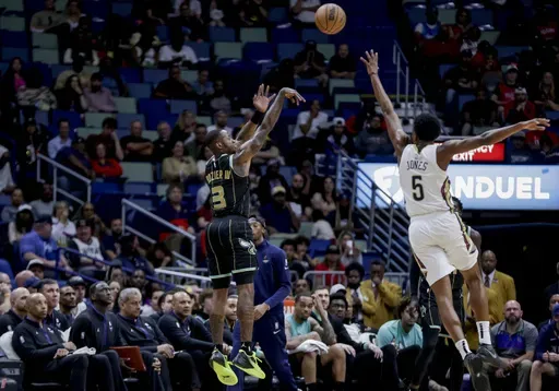 Charlotte Hornets guard Terry Rozier (3) shoots over New Orleans Pelicans forward Herbert Jones (5) during the first quarter of an NBA basketball game in New Orleans, Thursday, March 23, 2023. (AP Photo/Derick Hingle, File)