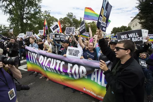 Supporters of LGBTQ rights stage a protest on the street in front of the U.S. Supreme Court on Oct. 8, 2019, in Washington. In a victory for the transgender community, and bucking the trend of other reliably red states, a Republican-controlled Louisiana legislative committee voted to a kill a bill Wednesday, May 24, 2023, that would have banned gender-affirming medical care for minors. (AP Photo/Manuel Balce Ceneta, File)