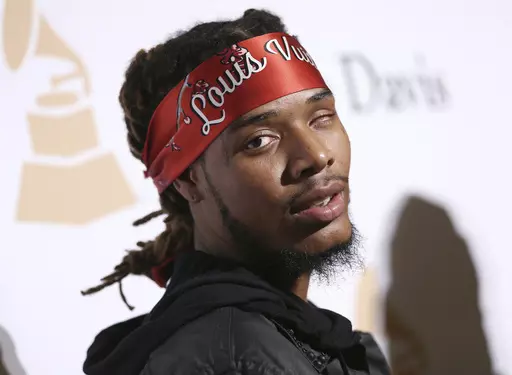 Fetty Wap arrives at the 2016 Clive Davis Pre-Grammy Gala at the Beverly Hilton Hotel, Feb. 14, 2016, in Beverly Hills, Calif. Rapper Fetty Wap has been sentenced to six years in federal prison on Wednesday, May 24, 2023, for his role in a New York-based drug-trafficking scheme. (Photo by John Salangsang/Invision/AP, File)