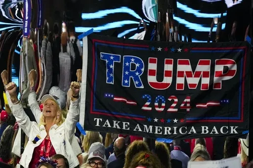 A supporter cheers during the Republican National Convention Thursday, July 18, 2024, in Milwaukee. (AP Photo/Charles Rex Arbogast)