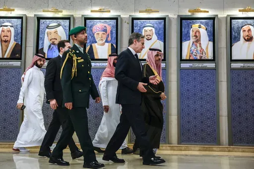 Saudi Arabia's Foreign Minister Prince Faisal bin Farhan bin Abdullah, right, and U.S. Secretary of State Antony Blinken, second right, walk to a Joint Ministerial Meeting of the GCC-U.S. Strategic Partnership to discuss the humanitarian crises faced in Gaza, in Riyadh, Saudi Arabia, Monday April 29, 2024. (Evelyn Hockstein/Pool via AP)
