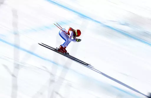 United States' Mikaela Shiffrin competes in the women's combined downhill at the 2018 Winter Olympics in Jeongseon, South Korea, Feb. 22, 2018. Winter Olympians in outdoor sports such as Alpine skiing or snowboarding say the weather can be a key factor in success or failure. (AP Photo/Alessandro Trovati, File)