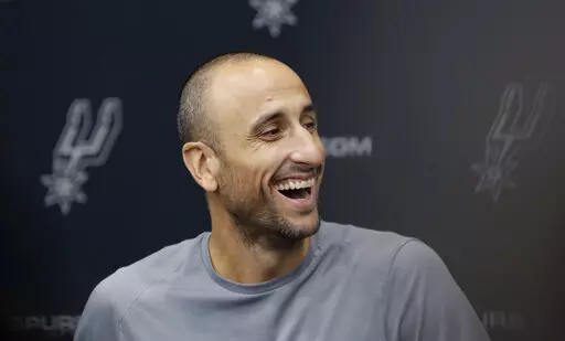 Former San Antonio Spurs guard Manu Ginobili jokes with the media at the NBA basketball team's practice facility, Saturday, Sept. 15, 2018, in San Antonio. NBA stars Manu Ginobili and Tim Hardaway are among five new  Basketball Hall of Fame inductees. Also selected this year were WNBA great Swin Cash, former NBA coach George Karl and long-time college coach Bob Huggins. They will be enshrined into the Naismith Memorial Basketball Hall of Fame in Springfield, Massachusetts, on Sept. 10, 2022   (A