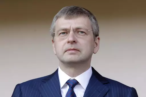 President of the football club AS Monaco, Dmitry Rybolovlev, attends a French league two soccer match between Monaco and Caen at the Louis II stadium on May 4, 2013, in Monaco. Sotheby’s defended itself at a trial Monday, Jan. 8, 2024, against accusations that it helped defraud Rybolovlev out of tens of millions of dollars, saying it knew nothing of wrongdoing by an art buyer who advised the billionaire on buying works by famed artists like Amedeo Modigliani and Leonardo da Vinci. (AP Photo/Li
