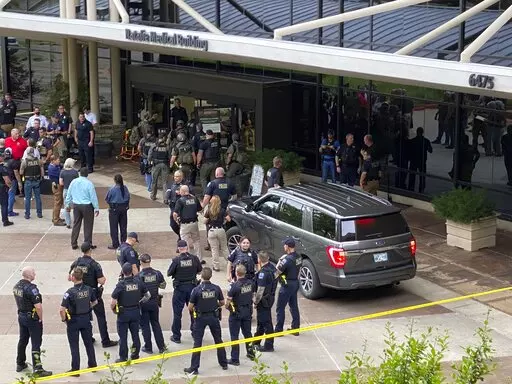 Emergency personnel respond to a shooting at the Natalie Medical Building Wednesday, June 1, 2022. in Tulsa, Okla. Multiple people were shot at a Tulsa medical building on a hospital campus Wednesday. (Ian Maule/Tulsa World via AP)