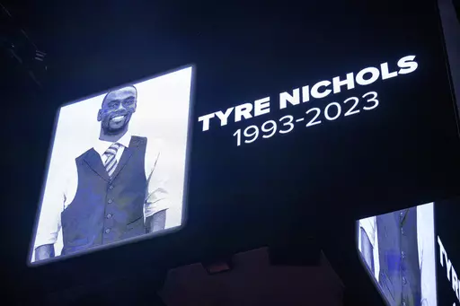 The screen at the Smoothie King Center in New Orleans honors Tyre Nichols before an NBA basketball game between the New Orleans Pelicans and the Washington Wizards, Jan. 28, 2023. The family of Tyre Nichols has sued the city of Memphis, Wednesday, April 19, and individual officers and emergency medical personnel involved in his case. (AP Photo/Matthew Hinton, File)