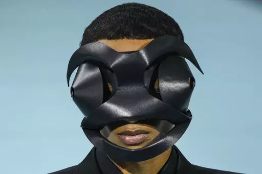 A model wears a creation for the Louis Vuitton fall-winter 22/23 men's collection, in Paris, Thursday, Jan. 20, 2022. (AP Photo/Francois Mori)