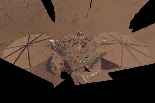 This image provided by NASA shows the InSight Mars lander in a selfie photo composite on April 24, 2022, the 1,211th Martian day, or sol, of the mission. (NASA/JPL-Caltech via AP, File)