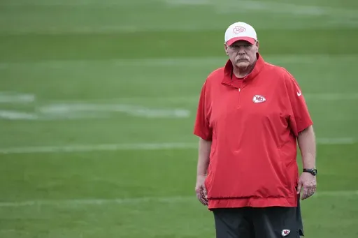 Kansas City Chiefs head coach Andy Reid watches his players stretch during an NFL football practice Thursday, Feb. 6, 2025, in New Orleans, ahead of Super Bowl 59 against the Philadelphia Eagles. (AP Photo/Brynn Anderson)