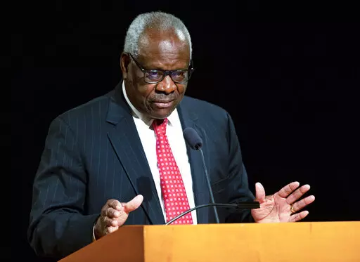 U.S. Supreme Court Associate Clarence Thomas speaks at the University of Notre Dame in South Bend, Ind., on Sept. 16, 2021. Thomas has been hospitalized because of an infection, the Supreme Court said Sunday, March 20, 2022. Thomas, 73, has been at Sibley Memorial Hospital in Washington, D.C., since Friday, March 18 after experiencing “flu-like symptoms,” the court said in a statement. (Robert Franklin/South Bend Tribune via AP, File)