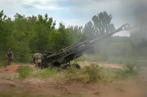 Ukrainian soldiers fire at Russian positions from a U.S.-supplied M777 howitzer in Ukraine's eastern Donetsk region, June 18, 2022. U.S. officials say the United States is poised to announce it will provide Ukraine with nearly $800 million in new military aid, including at least a dozen Scan Eagle surveillance drones. Officials say the bulk of the aid package will be additional Howitzers and ammunition, including Javelin missiles that the Ukrainian military has been using effectively to try and 