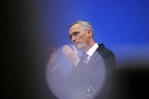 NATO Secretary General Jens Stoltenberg speaks during a media conference after convening an online NATO leaders summit at NATO headquarters in Brussels, Friday, Feb. 25, 2022. U.S. President Joe Biden and his NATO counterparts will seek Friday to reassure member countries on the alliance's eastern flank that their security is guaranteed as Russia's large-scale invasion of Ukraine closes in on the capital Kyiv. (AP Photo/Olivier Matthys)