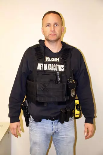 This March 13, 2020, photo provided by the Louisville Metro Police Department shows Officer Brett Hankison. A judge has denied a request from the legal team of Hankison, who took part in the deadly 2020 raid on Breonna Taylor’s home, to bar the media from part of his upcoming trial. But Jefferson Circuit Judge Ann Bailey Smith ruled Thursday, Jan. 27, 2022, that the media can’t bring cameras into the courtroom while individual prospective jurors are questioned ahead of the trial. (Louisville