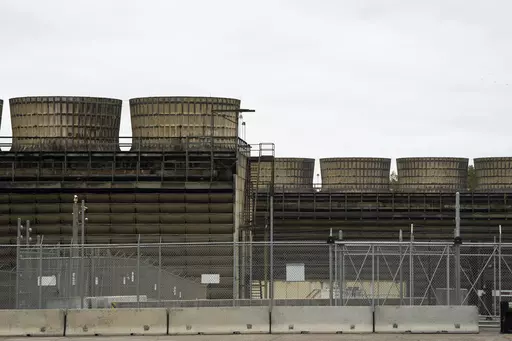 Cooling towers release heat generated by boiling water reactors at Xcel Energy's Nuclear Generating Plant on Oct. 2, 2019, in Monticello, Minn. Minnesota regulators said Thursday, March 16, 2023, that they're monitoring the cleanup of a leak of 400,000 gallons of radioactive water from Xcel Energy's Monticello nuclear power plant in late November 2022. The company said there's no danger to the public. (Evan Frost/Minnesota Public Radio via AP, File)