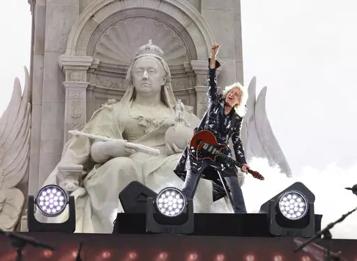 Queen guitarist Brian May performs during the Platinum Jubilee concert taking place in front of Buckingham Palace, London June 4, 2022. May, who is also an animal welfare campaigner, was appointed a knight bachelor for his services to music and charity New Year’s Honors list on Friday, Dec. 30, 2022, the first to be signed off by Britain's King Charles III. (Jonathan Buckmaster/Pool Photo via AP, file)