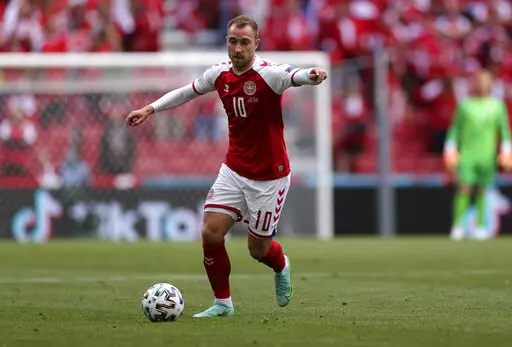 Denmark's Christian Eriksen controls the ball during the Euro 2020 soccer championship group B match between Denmark and Finland at Parken stadium in Copenhagen, June 12, 2021. Denmark international Christian Eriksen is training with the second team at his former club Ajax to stay fit while he seeks a new club. The 29-year-old playmaker has not played since collapsing during Denmark’s opening match at the European Championship against Finland in June. His contract with Inter Milan was terminat