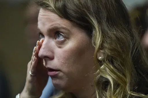 Shani Segal speaks during a news conference inside the state capitol, Monday, Oct. 30, 2023, in Atlanta. Family members of people kidnapped by Hamas spoke to reporters, bookended by remarks from Georgia lawmakers supportive of Israel and the Israeli consul general. (AP Photo/Mike Stewart)
