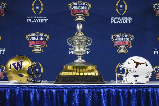 The Sugar Bowl Classic Championship Trophy is displayed at Texas Media Day ahead of the Sugar Bowl, Saturday, Dec. 30, 2023, in New Orleans, La. Texas will take on Washington on Monday, Jan. 1, 2024. (Aaron E. Martinez/Austin American-Statesman via AP)