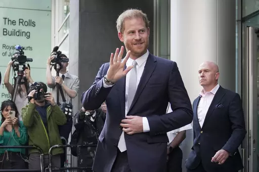 Prince Harry leaves the High Court after giving evidence in London, on June 7, 2023. Prince Harry won his phone hacking lawsuit Friday Dec. 15, 2023 against the publisher of the Daily Mirror and was awarded over 140,000 pounds ($180,000) in the first of his several lawsuits against the tabloids to go to trial. (AP Photo/Kin Cheung, File)