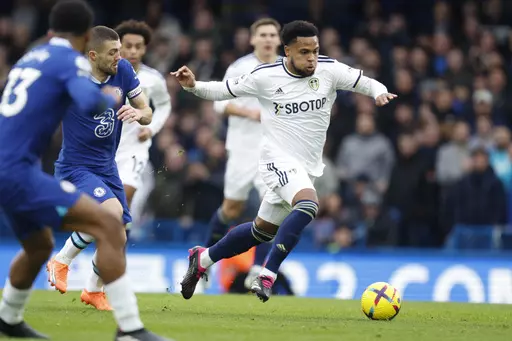 Leeds United's Weston McKennie, right, and Chelsea's Mateo Kovacic, second from left, challenge for the ball during the English Premier League soccer match between Chelsea and Leeds United at at the Stamford Bridge stadium in London, Saturday, March 4, 2023. The San Francisco 49ers have reached an agreement to take over English soccer club Leeds with NBA players Larry Nance Jr. and T.J. McConnell joining the ownership group as minority investors. (AP Photo/David Cliff, File)