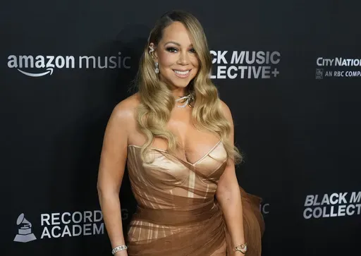 Mariah Carey appears at the third annual Recording Academy Honors in Los Angeles, Feb. 1, 2024. (AP Photo/Damian Dovarganes, File)