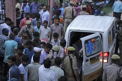 An injured arrives in an ambulance at the Sikandrarao hospital in Hathras district about 350 kilometers (217 miles) southwest of Lucknow, India, Tuesday, July 2, 2024. Thousands of people at a religious gathering in India rushed to leave a makeshift tent, setting off a stampede Tuesday that killed more than hundred people and injured scores. (AP Photo/Manoj Aligadi)