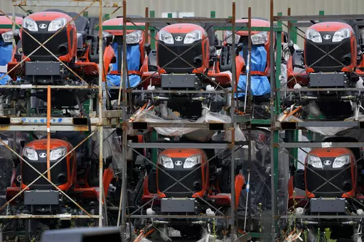 Kubota tractors are stored in Uniontown, Pa., Friday, June 9, 2023. On Thursday, the Commerce Department issues its first of three estimates of how the U.S. economy performed in the second quarter of 2023. (AP Photo/Gene J. Puskar)