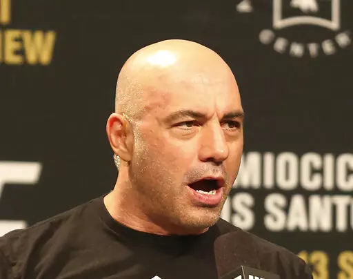 Joe Rogan is seen during a weigh-in before UFC 211 on Friday, May 12, 2017, in Dallas before UFC 211.  Spotify’s popular U.S. podcaster has apologized after a video compilation surfaced that showed him using racial slurs in clips of episodes over a 12-year span. In a video posted on his Instagram account on Saturday, Feb. 5, 2022, Rogan who hosts a podcast called “The Joe Rogan Experience,” said his use of the slurs was the “most regretful and shameful thing that I’ve ever had to talk 