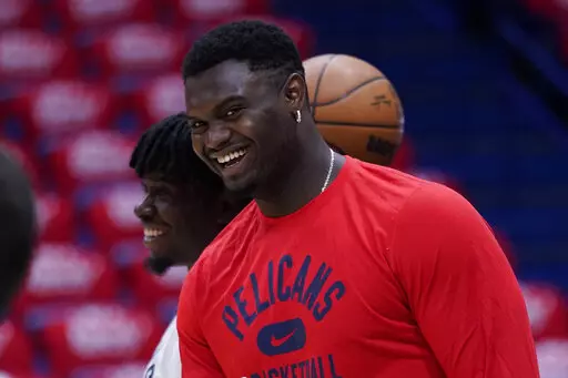 New Orleans Pelicans forward Zion Williamson (1) watches a shoot around before game six of an NBA basketball first-round playoff series against the Phoenix Suns, Friday, April 29, 2022 in New Orleans. (AP Photo/Gerald Herbert)