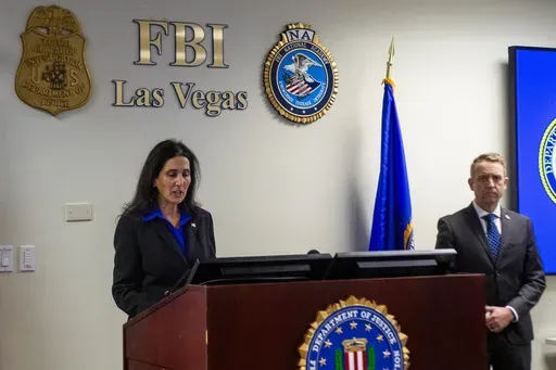 Acting United States Attorney for the District of Nevada Sue Fahami speaks about an alleged romance scheme that turned deadly during a news conference in Las Vegas, Friday, Feb. 21, 2025. (AP Photo/Ty ONeil)