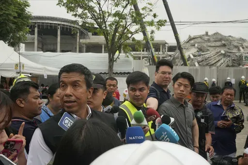 Bangkok Gov. Chadchart Sittipunt talks to the media at the site of an under-construction high-rise building that collapsed after an earthquake in Bangkok, Thailand, Monday, March, 31, 2025. (AP Photo/Manish Swarup)