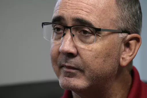 United Auto Workers President Shawn Fain is interviewed, Wednesday, Sept. 6, 2023, in Detroit. Fain, who won the UAW’s presidency this spring in the first direct election by members, says the union plans to go on strike against any Detroit automaker that doesn't have an agreement by the time contracts expire next week. (AP Photo/Carlos Osorio)